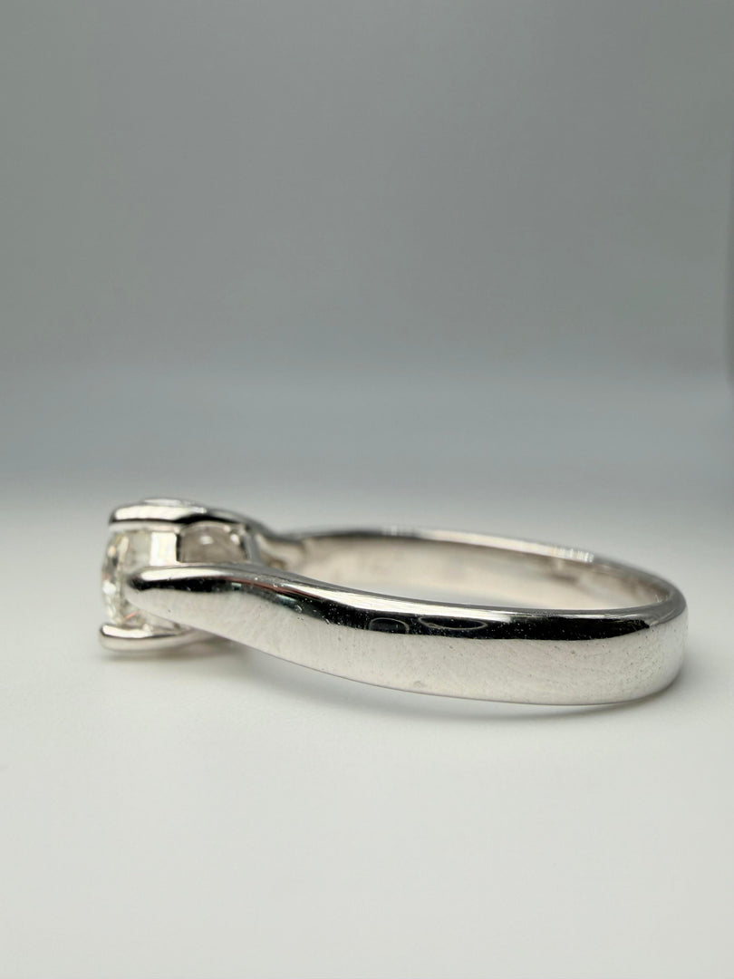 14Kt White Gold Solitaire Ring With Round Center Diamond Approximately .60Ct With A Color Of G And A Clarity Of Vs2. Partial Cert Number R02421.155