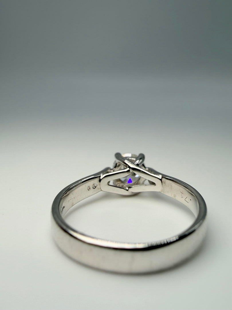 14Kt White Gold Solitaire Ring With Round Center Diamond Approximately .60Ct With A Color Of G And A Clarity Of Vs2. Partial Cert Number R02421.155