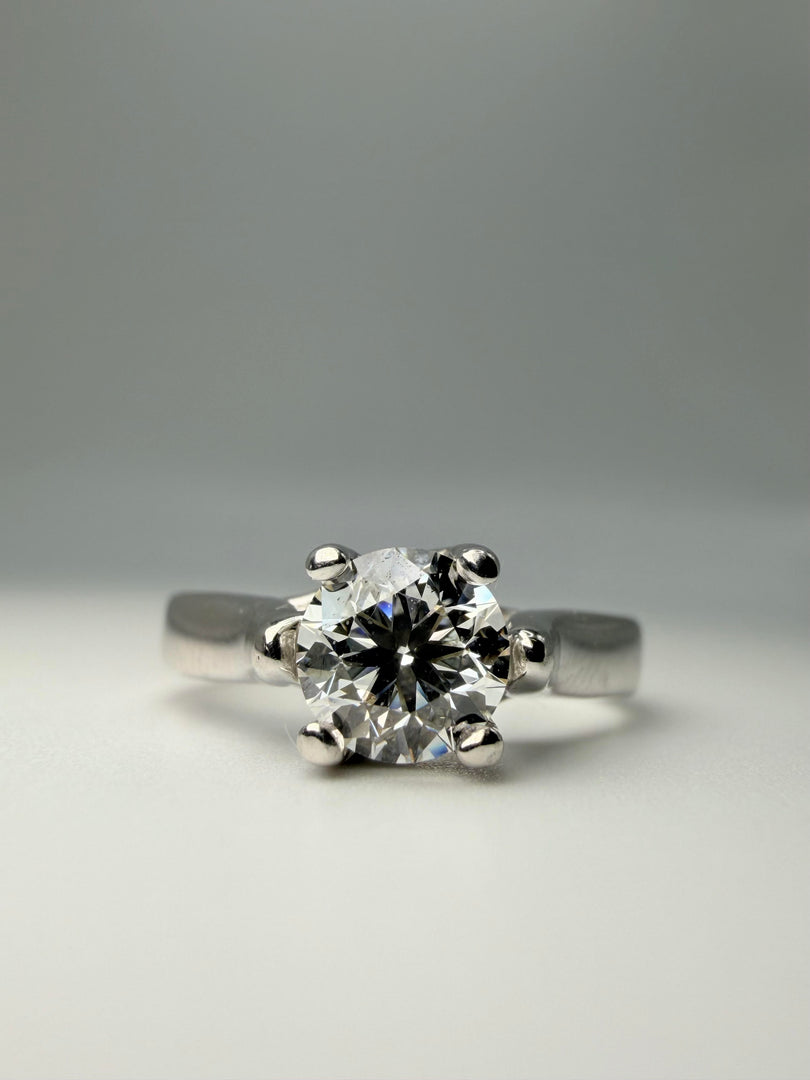14Kt White Gold Solitaire Ring With Round Center Diamond Approximately .60Ct With A Color Of G And A Clarity Of Vs2. Partial Cert Number R02421.155