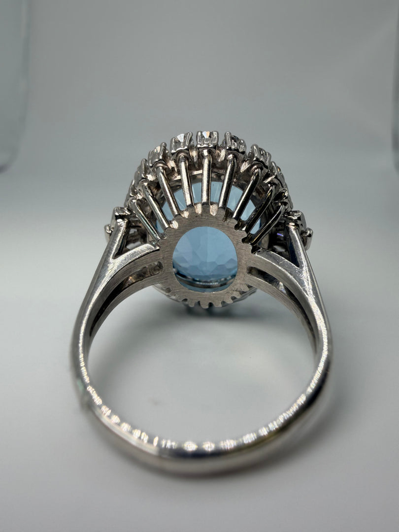 Platinum Oval 13.32Ct Aqumarine Ring With Diamond Halo Weighing 0.95CTW