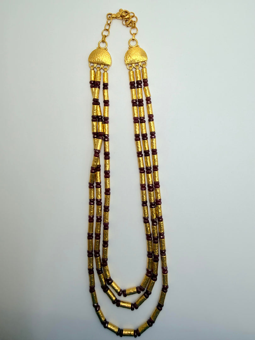 Gurhan Triple Strand Necklace In 24Kt Yellow Gold Featuring (.80Cts) Ruby Beads And Gold Gale Tubes. The Necklace "Vertigo" Is 15-17" Adjustable  With 22Kt Gold Handmade Clasp