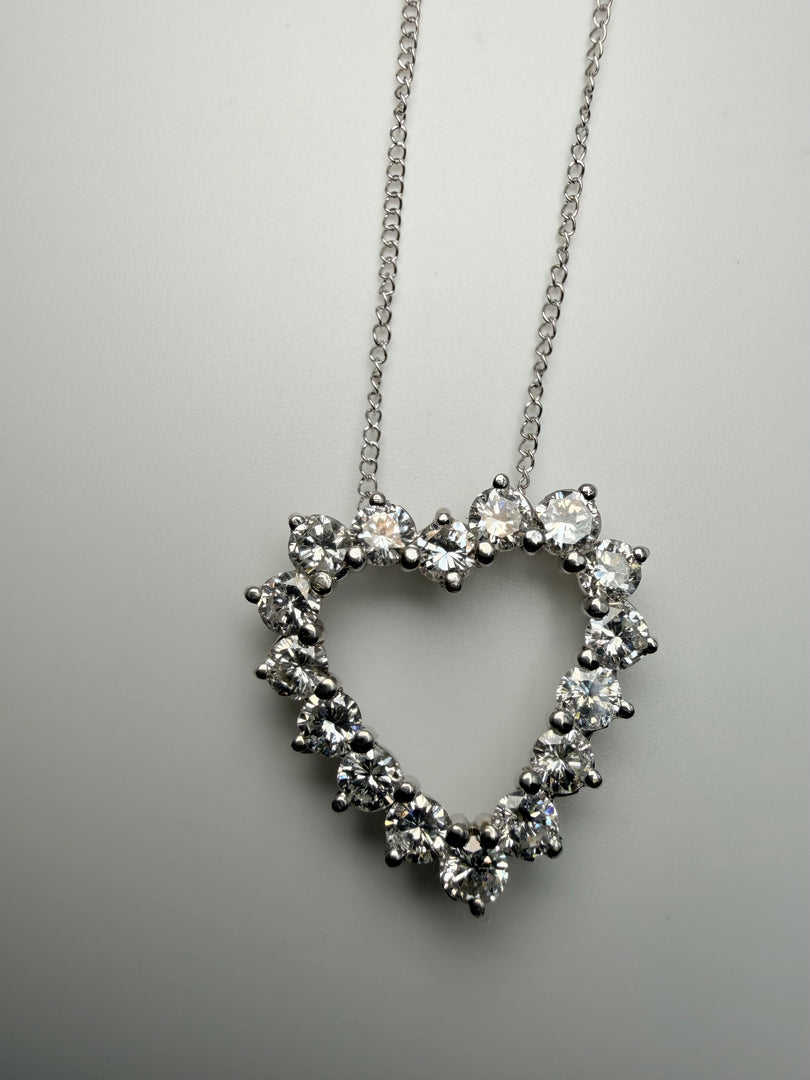 14Kt White Gold Heart Shaped Pendant With 16 Round Diamonds Totalling Approximately 1.50Ct (With 14Kt White Gold Chain)