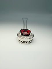 14Kt White Gold Oval Garnet Center With 1/8Tw Diamond Halo And On Bail Necklace (25328501)