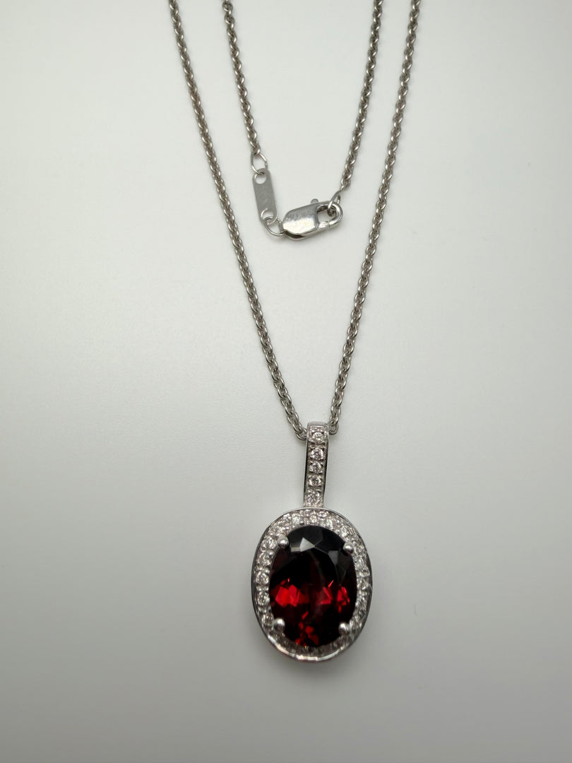 14Kt White Gold Oval Garnet Center With 1/8Tw Diamond Halo And On Bail Necklace (25328501)