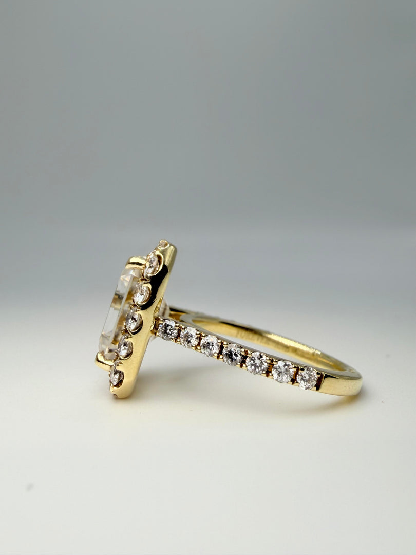 14Kyt Yellow Gold 3.37Ct "Forever One" Emerald Cut Moissanite Center Stone With Diamond Halo And Down The Band Totaling 0.95Cts G-Si