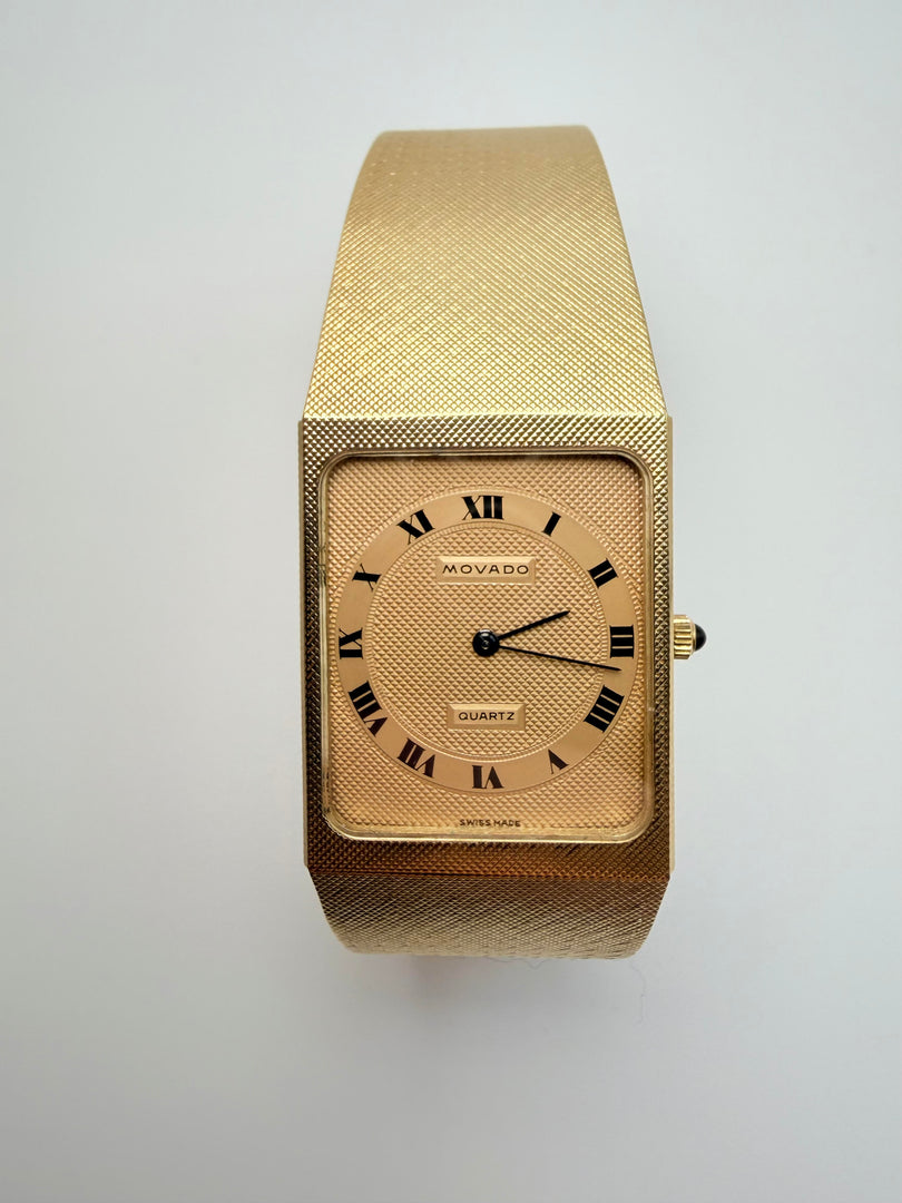 14Kt Yellow Gold Movado Quartz Watch With Roman Numerals And Gemstone Crown