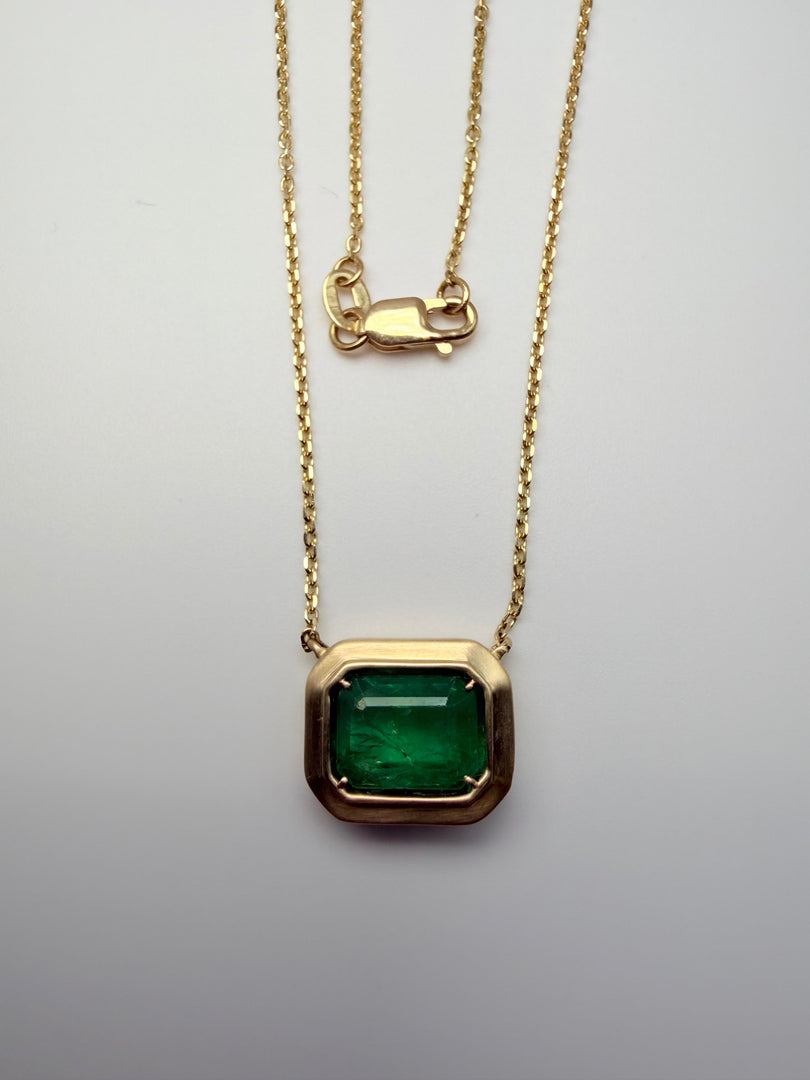 14Kt Yellow Gold Bezel Set Natural Emerald With A Satin Finish Bezel