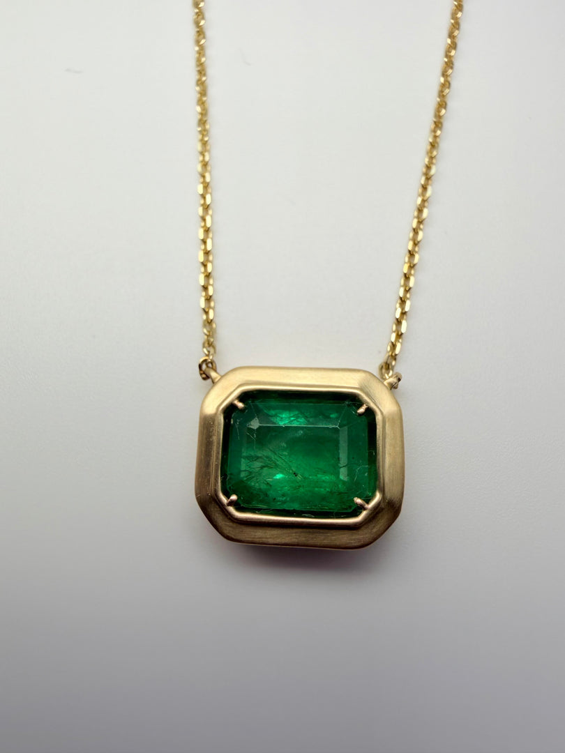 14Kt Yellow Gold Bezel Set Natural Emerald With A Satin Finish Bezel