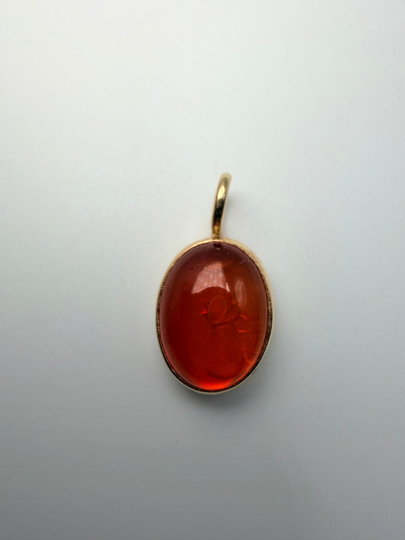 Fire Opal Pendant With 14Kt Yellow Gold Bezel