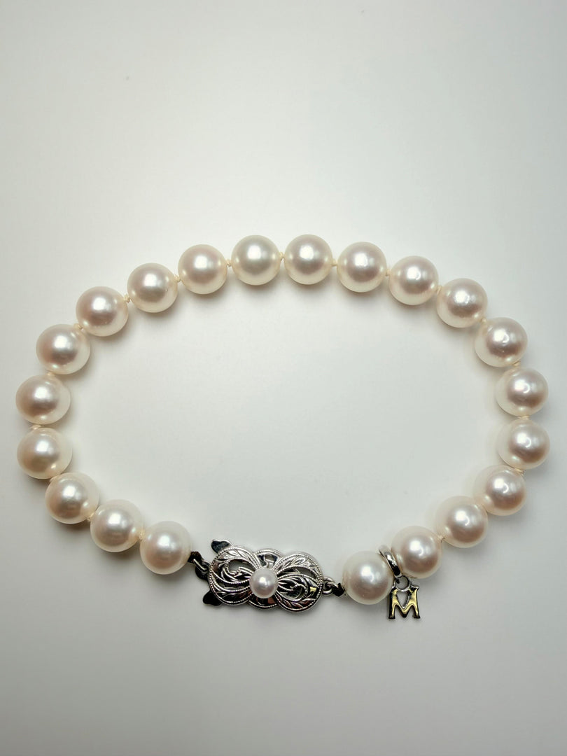 Mikimoto 7.2Mm Akoya Pearl Strand Bracelet With Signature Mikimoto Emblem 18Kt White Gold And 21 Pearls