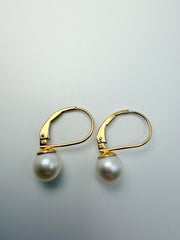 14Kt Yellow Gold Lever Back Earrings With 7Mm Half Drilled A Cultured White Akoya Pearls