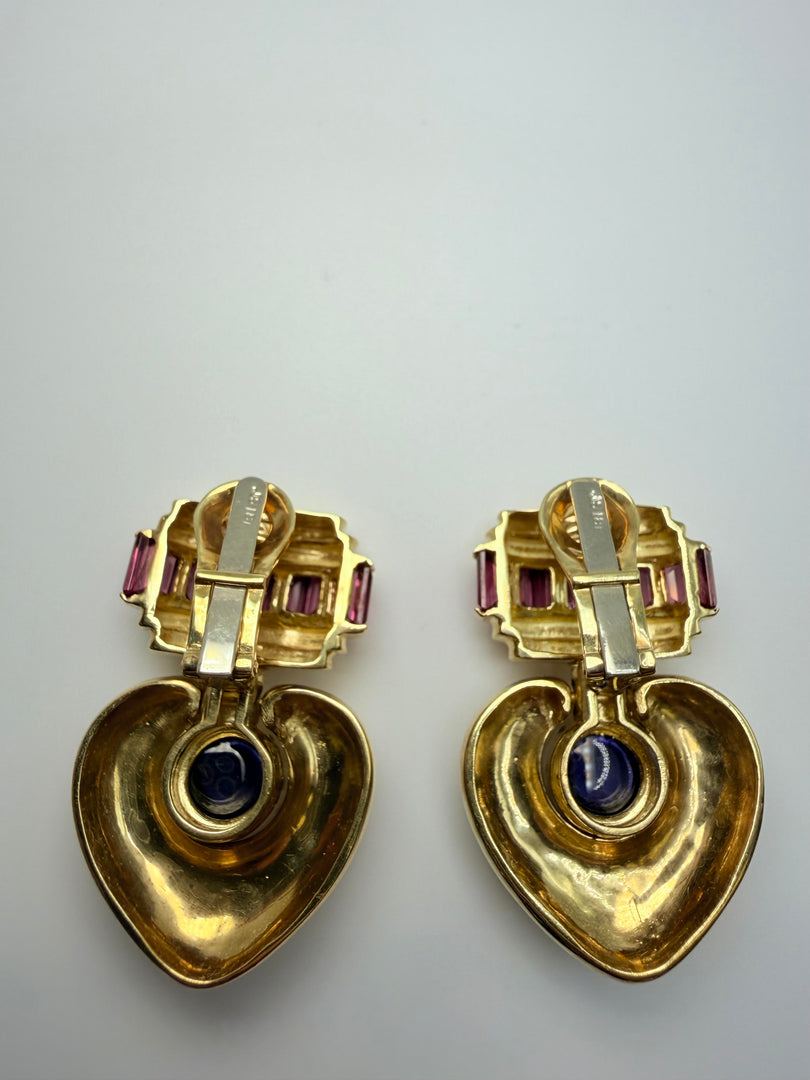 18Kt Yellow Gold Clip Earrings With Pink Tourmaline Channel Set Emerald Cut Stones And Blueish Purple Cabachon Stone