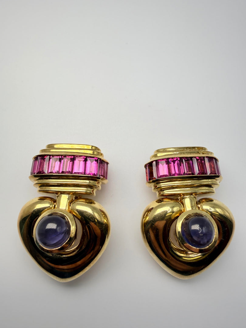 18Kt Yellow Gold Clip Earrings With Pink Tourmaline Channel Set Emerald Cut Stones And Blueish Purple Cabachon Stone
