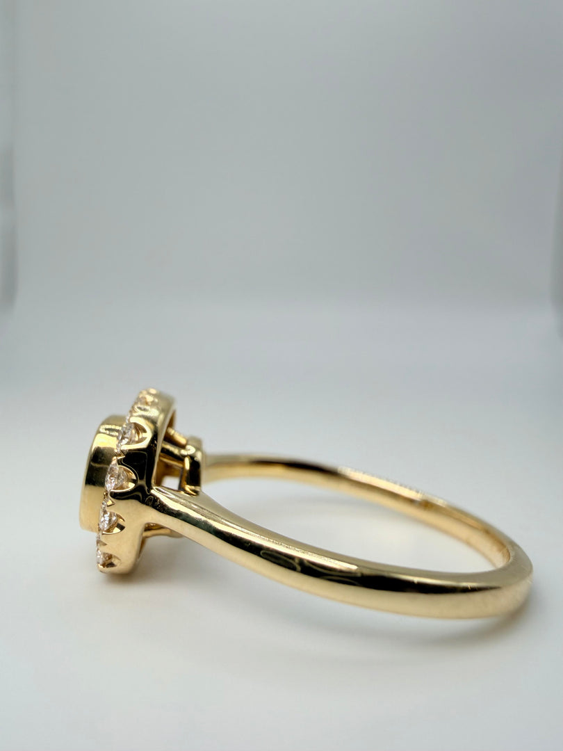 14Kt Yellow Gold .75Ct Sapphire Bezel-Set Center With 1/4Tw Diamond Halo Ring (25091075)