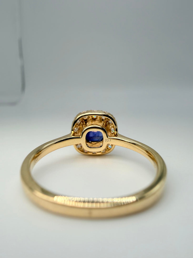14Kt Yellow Gold .75Ct Sapphire Bezel-Set Center With 1/4Tw Diamond Halo Ring (25091075)