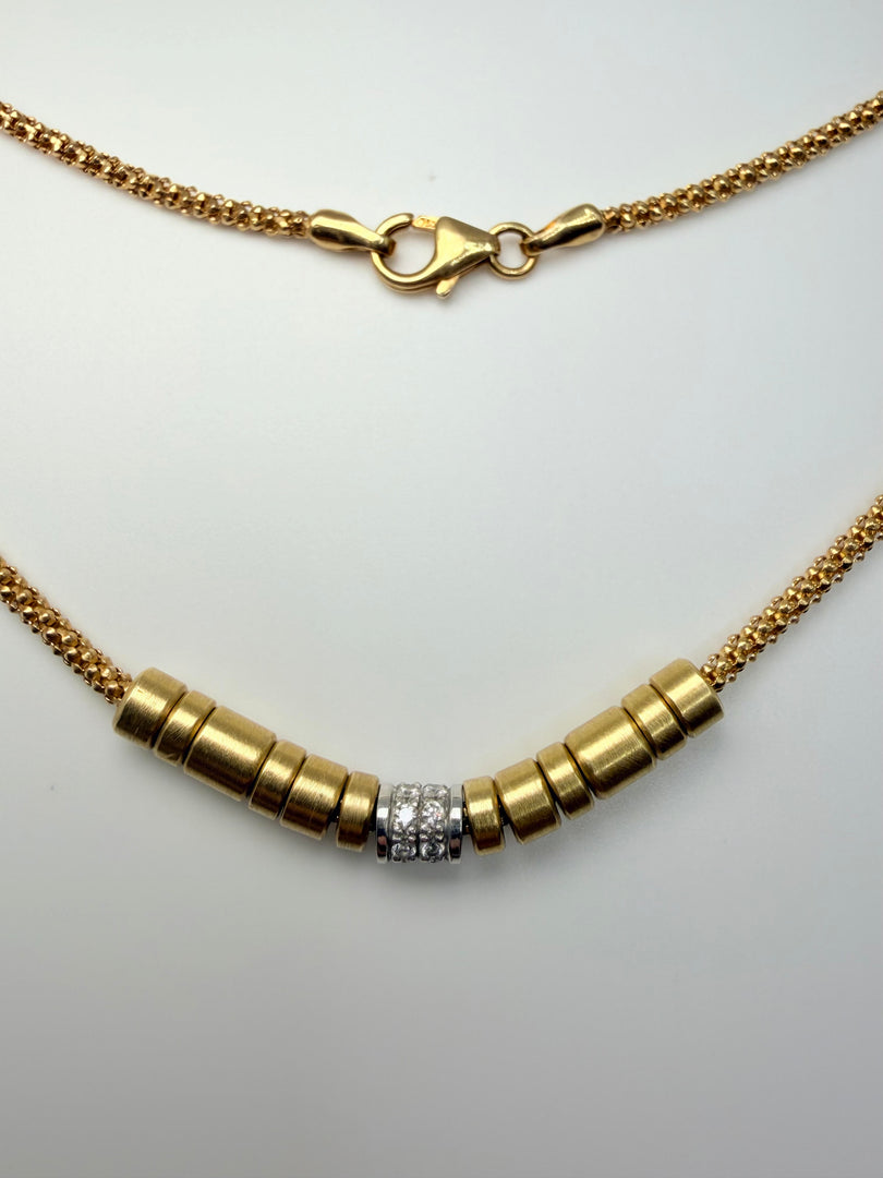 18Kt Yellow Gold Textured Chain With Sliding Satin Finished Beads Center Has Small Diamonds 17"