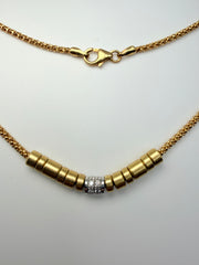 18Kt Yellow Gold Textured Chain With Sliding Satin Finished Beads Center Has Small Diamonds 17