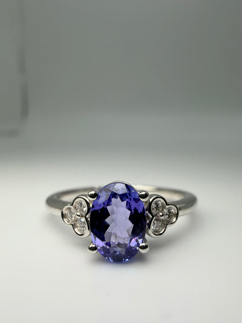 14Kt White Gold .87Ct Oval Tanzanite Center With .09Tw Diamonds Ring (25210881)