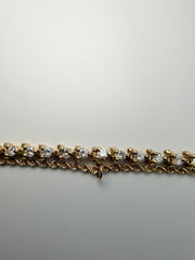 14Kt Yellow Gold Diamond Tennis Bracelet With 48 Round Diamonds Weighing Approximately 1.50CTW
