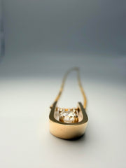 14Kt Yellow Gold U Shaped Pendant With One Round Brilliant Diamond Weighing Approximately 0.30CTW G-Si1