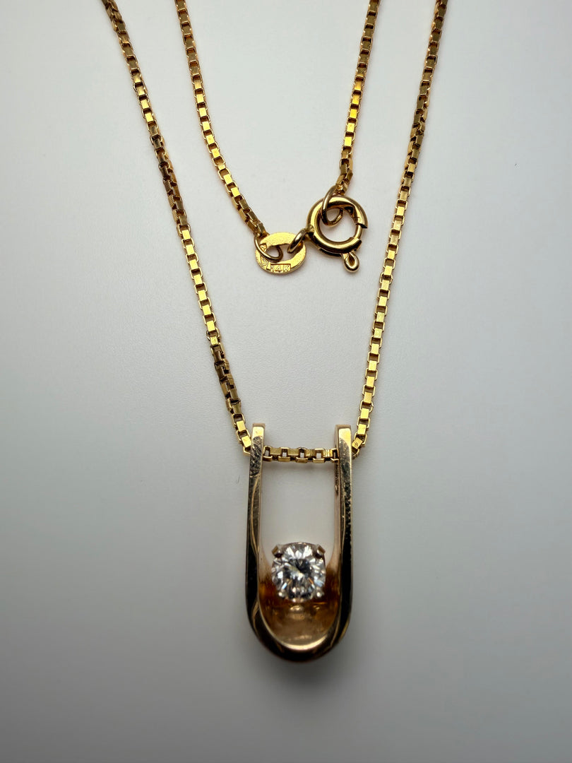 14Kt Yellow Gold U Shaped Pendant With One Round Brilliant Diamond Weighing Approximately 0.30CTW G-Si1