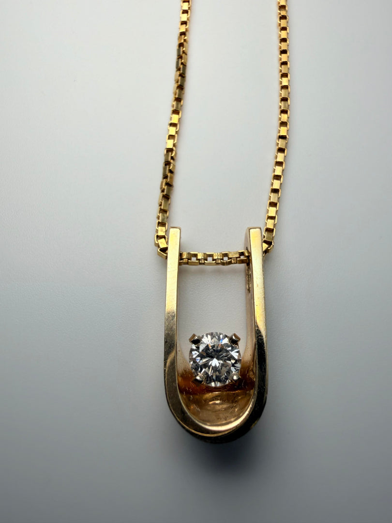 14Kt Yellow Gold U Shaped Pendant With One Round Brilliant Diamond Weighing Approximately 0.30CTW G-Si1