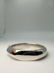 14Kt White Gold Tension Set Diamond Ring With A 0.40Ct J/Vsi  Round Stone With Flat Sides On A Wide Band